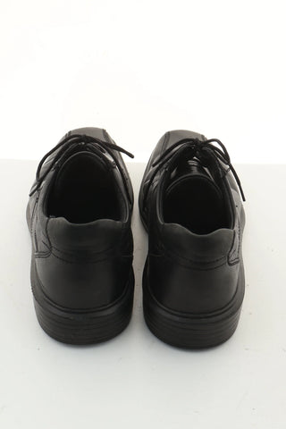 Black leather slippers