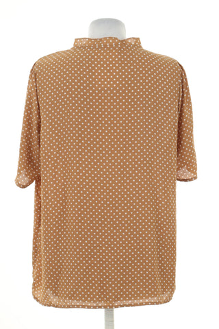 Beige blouse with dots