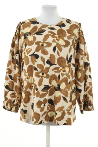 Beige blouse flowers