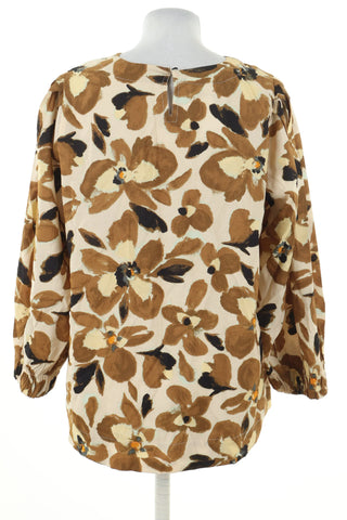 Beige blouse flowers