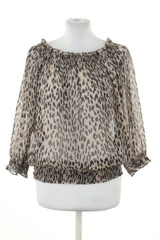 Beige blouse with spots