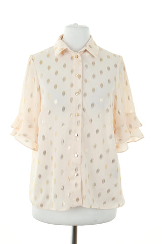 Beige blouse with pattern