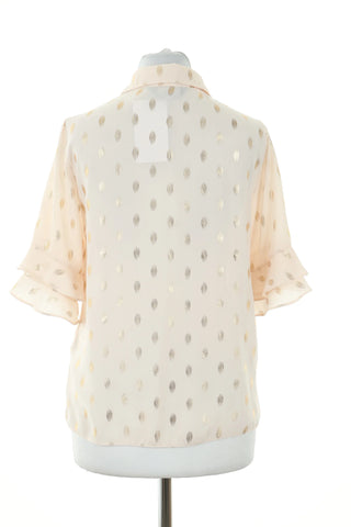 Beige blouse with pattern